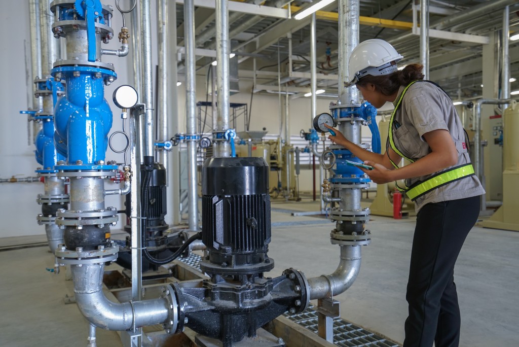 Engineer checking the water pump