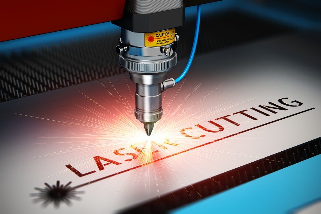 Laser cutting and engraving machine