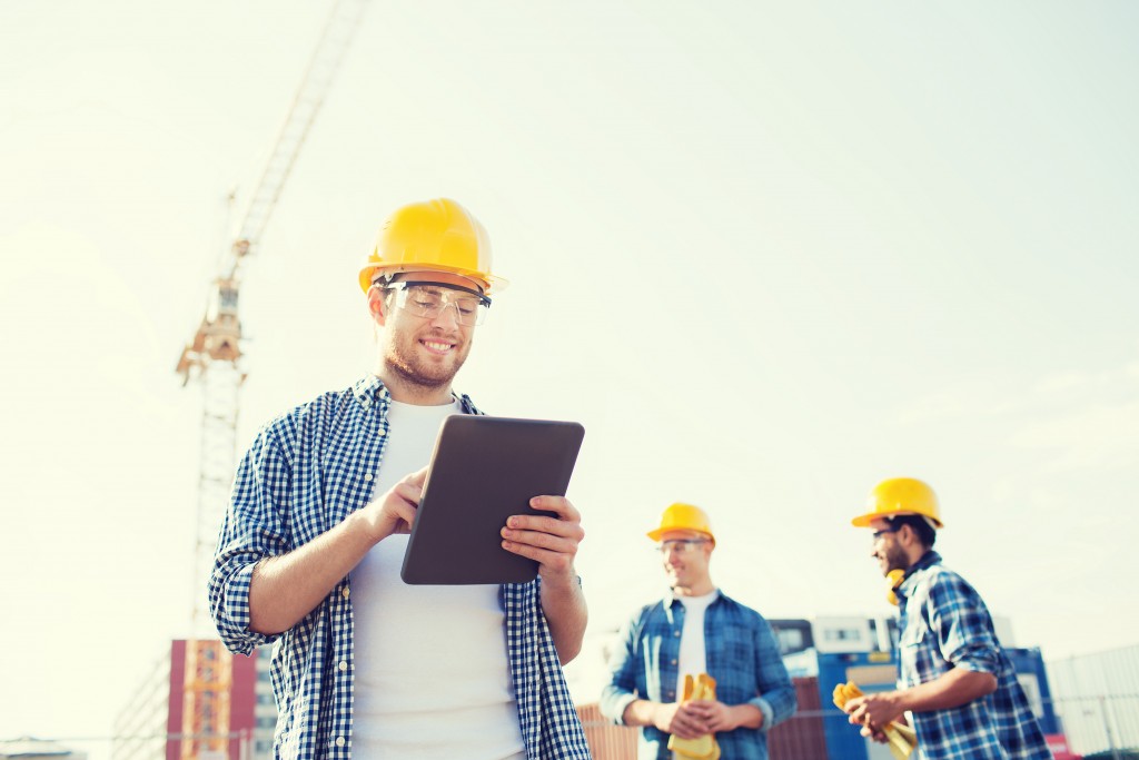 worker looking at graphic tablet