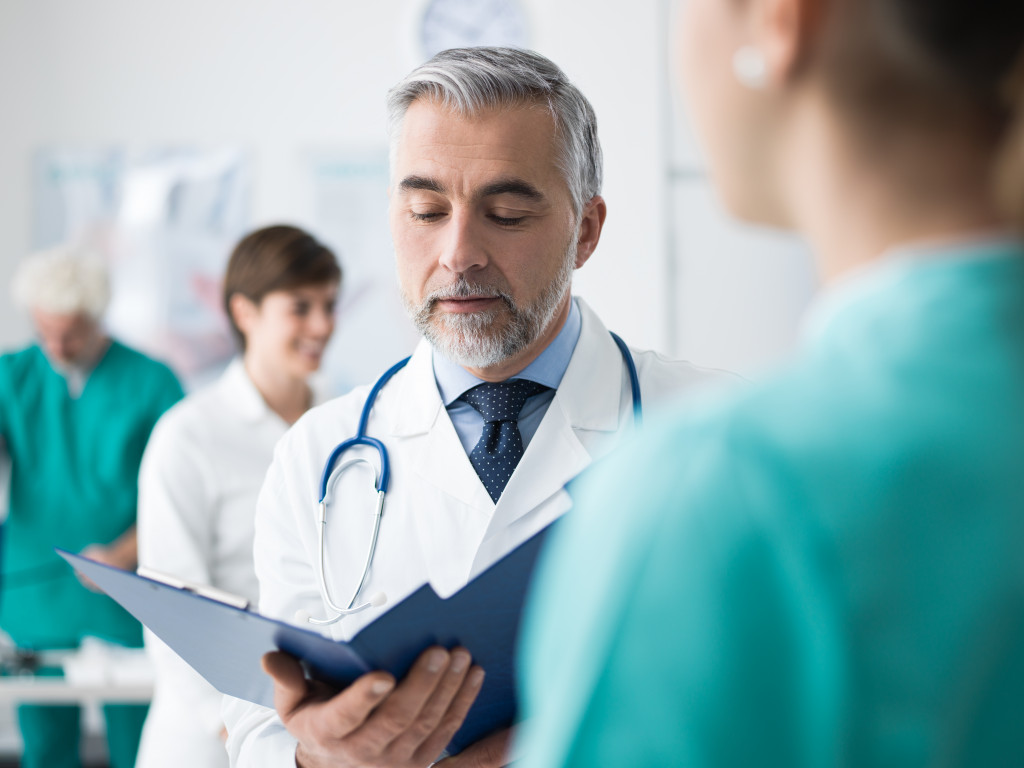 doctor speaking with a patient